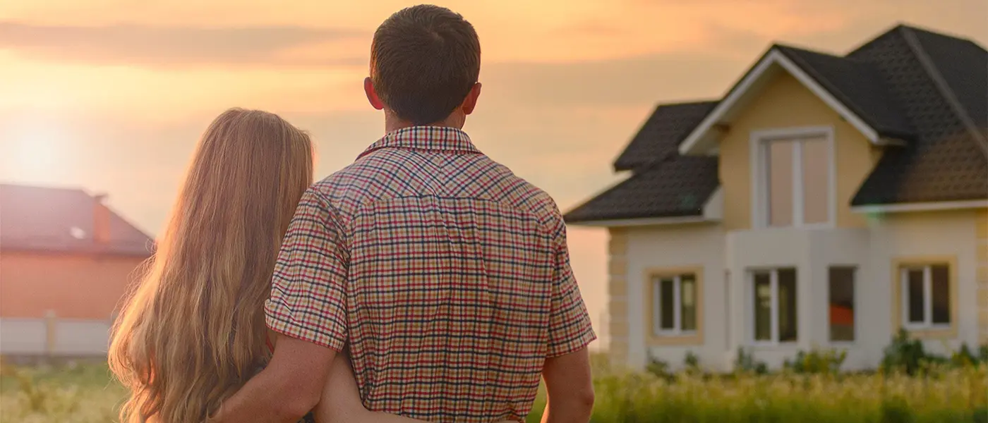 Young couple looking at dream home